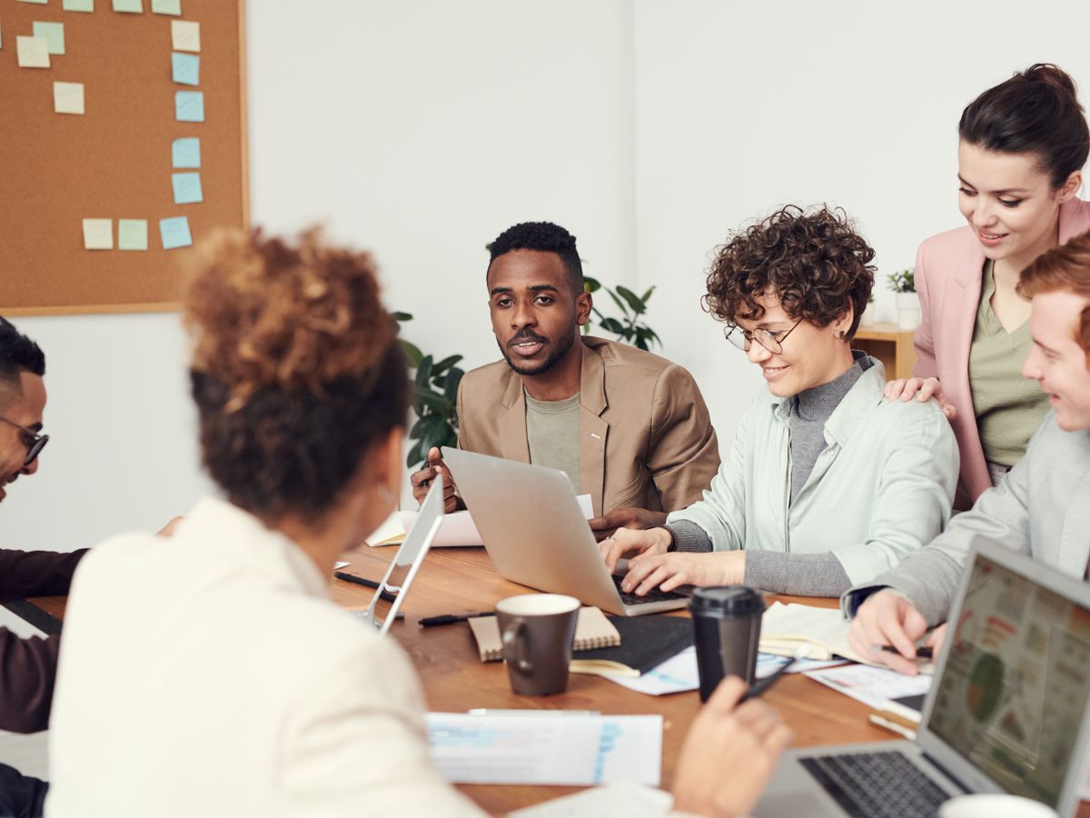 Cost-reduction advisor reviewing analytics dashboard
